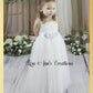 Flower girl dresses in all white tulle and lace