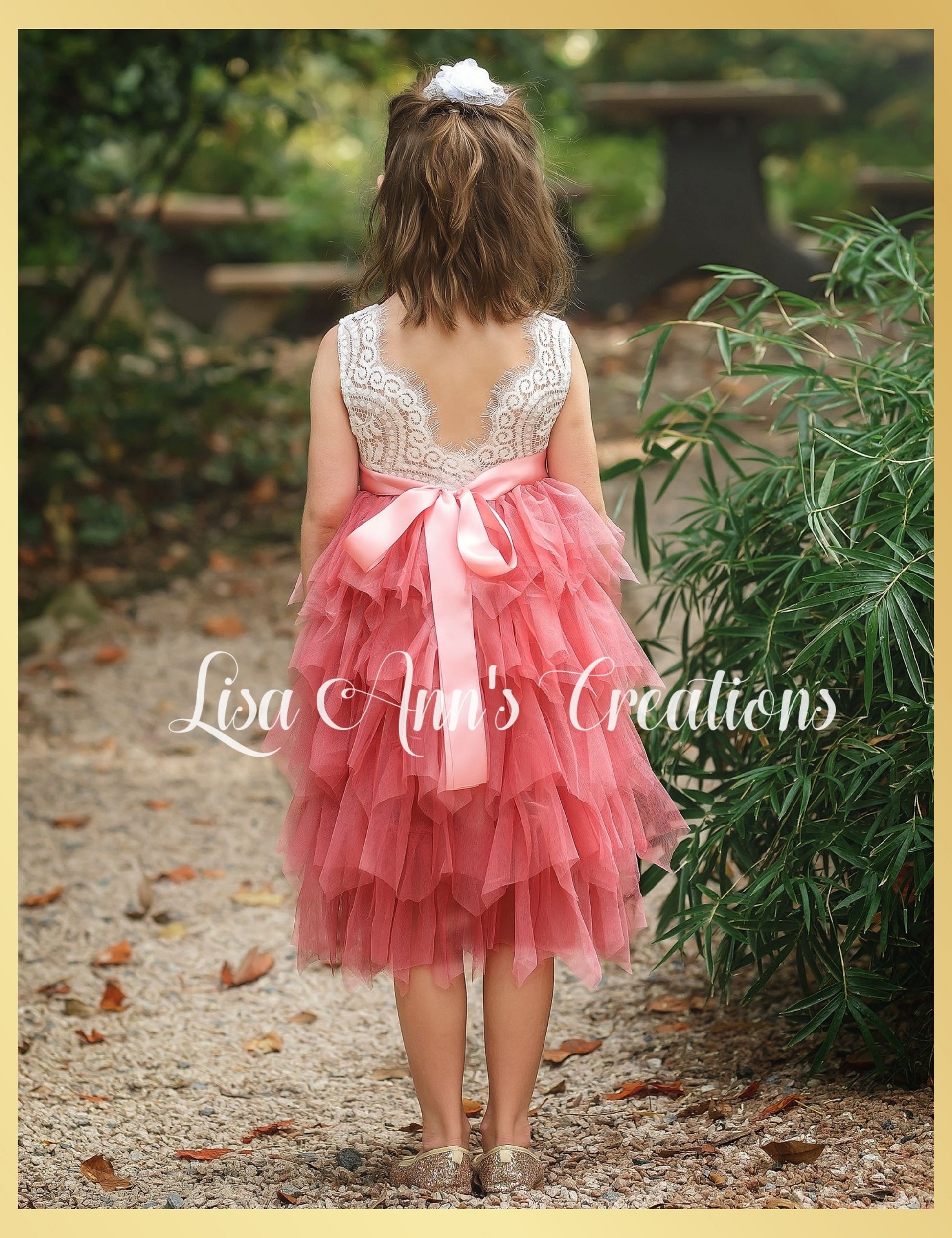 open back v shaped flower girl dress in dusty rose tulle with white lace that is knee length