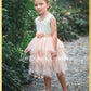 Bohemian flower girl dress in light peach tulle sleeveless