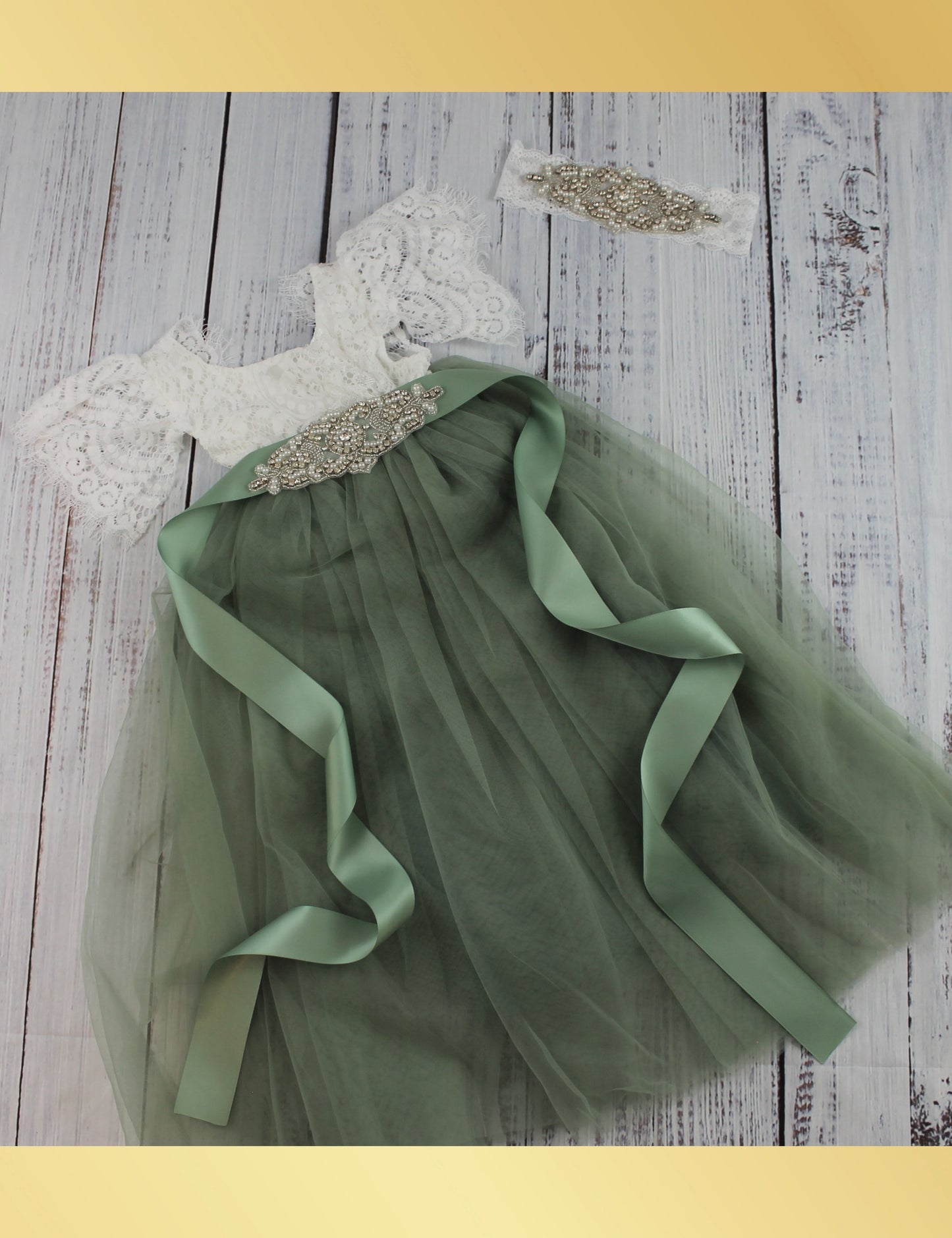 Sage green junior bridesmaid in short sleeve white lace with full length tulle