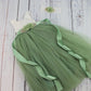 Full length flower girl dress in sage green with white sleeveless lace